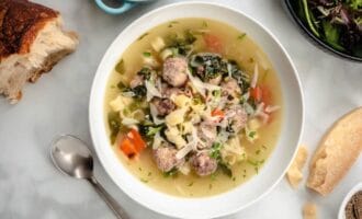 Italian wedding soup on the table photo