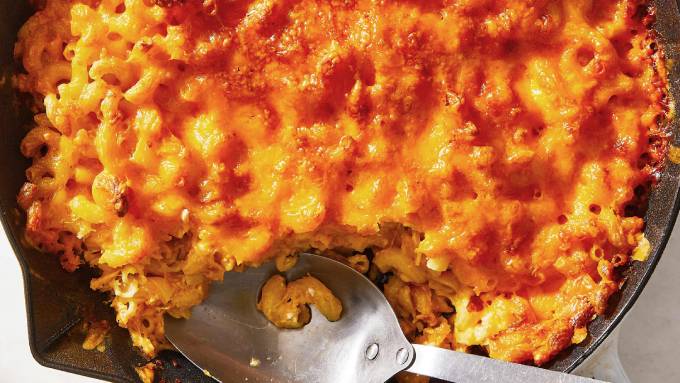 Golden-brown baked mac and cheese in a skillet.