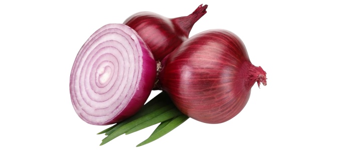 Three glossy red onions.