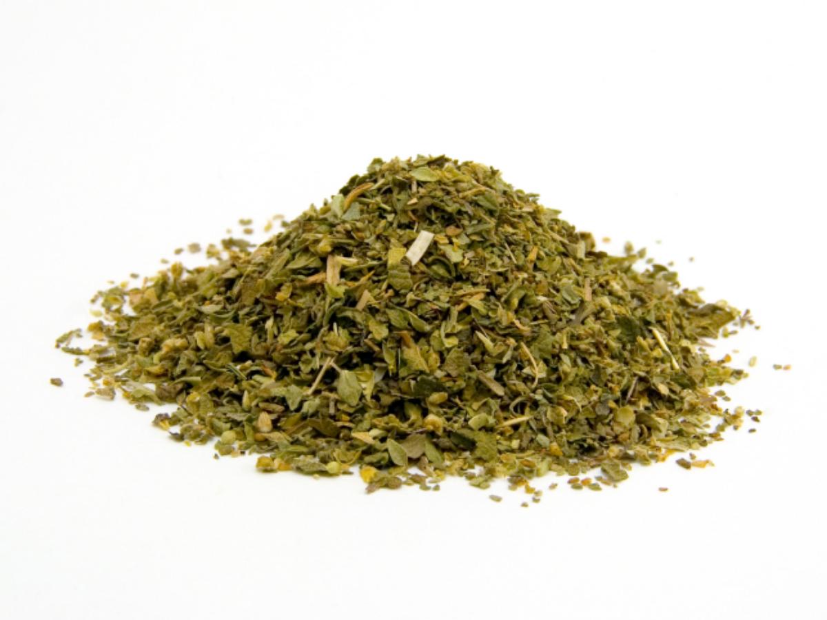 A small Oregano of mixed dried herbs, green and brown.