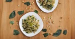 Alfalfa and quinoa bowl with fresh sprouts, vegetables, and herbs