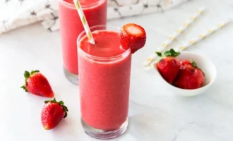 Fresh strawberry breakfast smoothie in a glass