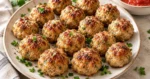 Oven-baked ground turkey meatballs with parsley and marinara sauce