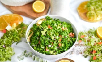 Cauliflower-based grain-free tabbouleh salad with fresh herbs and vegetables