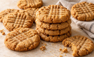 Soft and chewy creamy peanut butter cookies with fork marks
